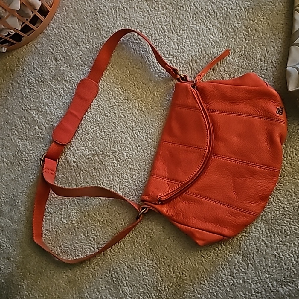 The SAK brand leather crossbody purse